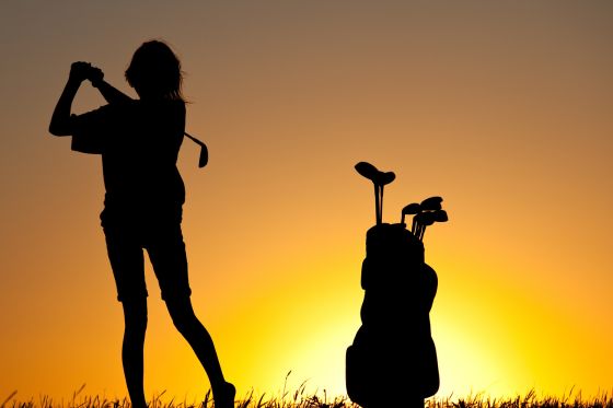 Woman who avoid Lower Back Pain While Golfing
